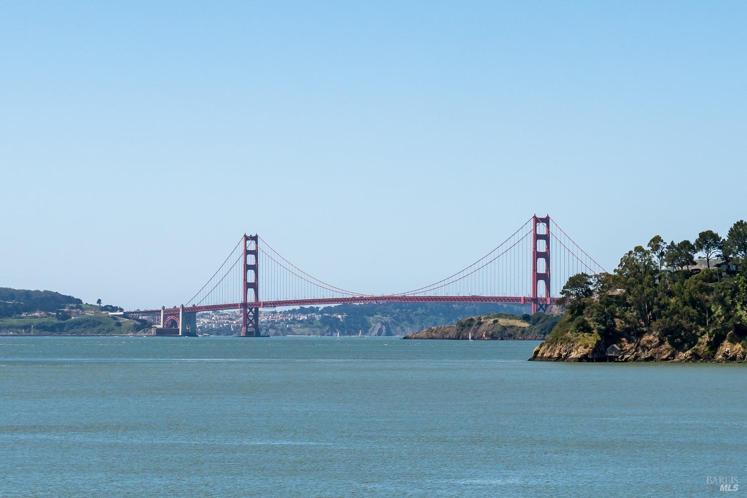 a view of a ocean with a large bridge
