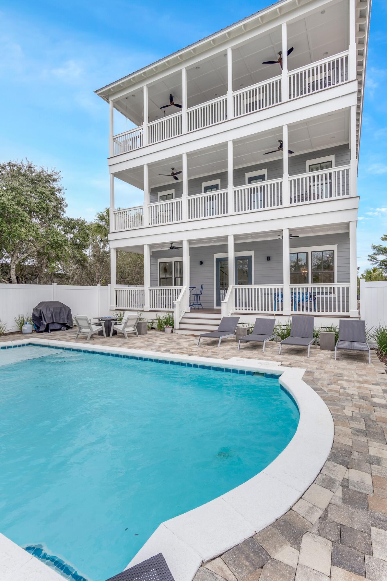 101 A St Inlet Beach Inlet Beach, FL 32461 - Photo 15 of 49 a view of a house with swimming pool and porch
