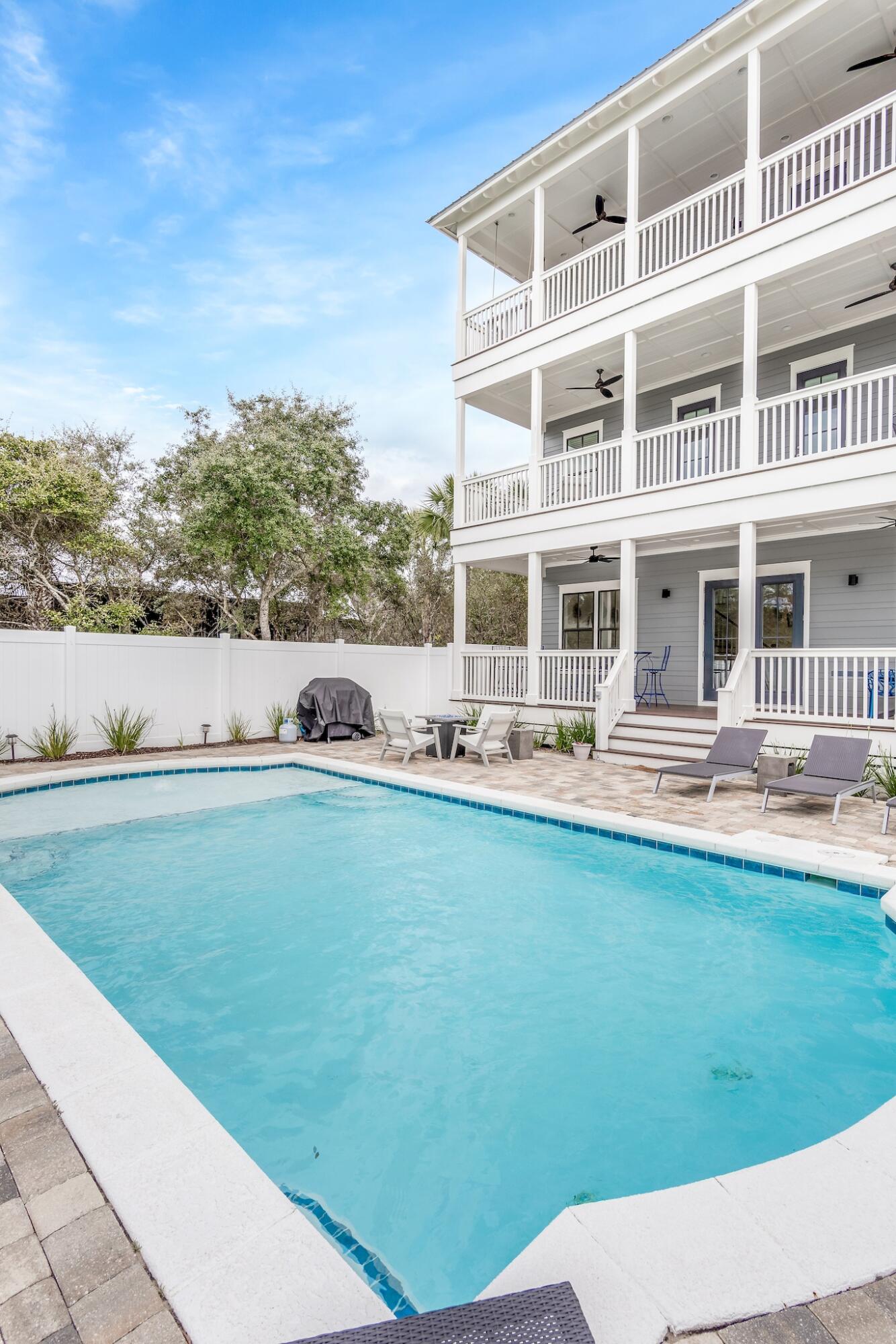 101 A St Inlet Beach Inlet Beach, FL 32461 - Photo 16 of 49 a view of swimming pool with outdoor seating and plants