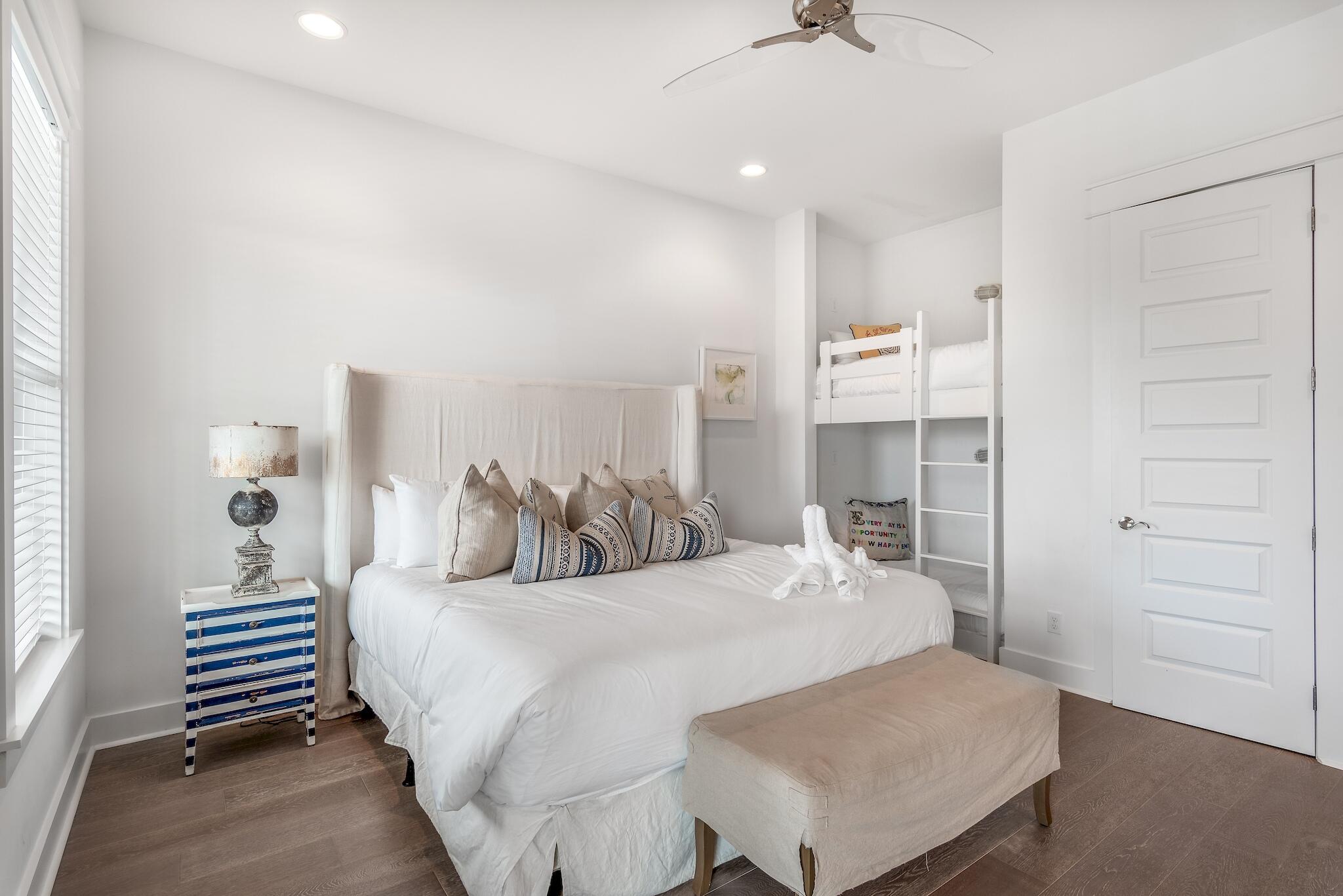 101 A St Inlet Beach Inlet Beach, FL 32461 - Photo 23 of 49 a bedroom with a bed and a cabinets