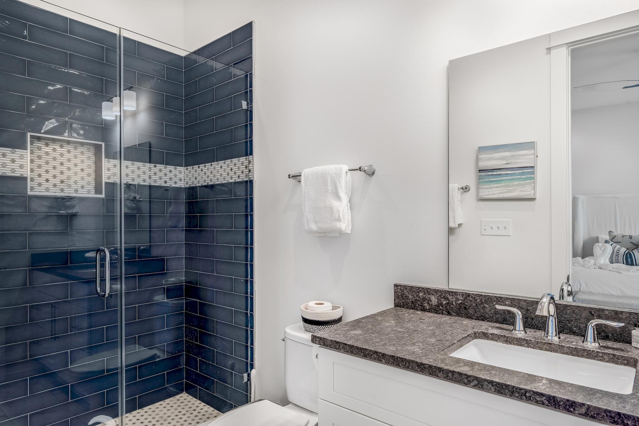 101 A St Inlet Beach Inlet Beach, FL 32461 - Photo 24 of 49 a bathroom with a granite countertop sink a toilet and shower