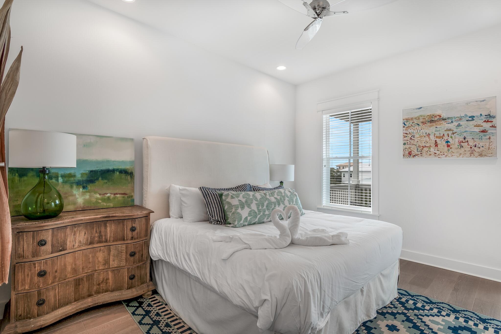 101 A St Inlet Beach Inlet Beach, FL 32461 - Photo 25 of 49 a bedroom with a bed dresser and a window