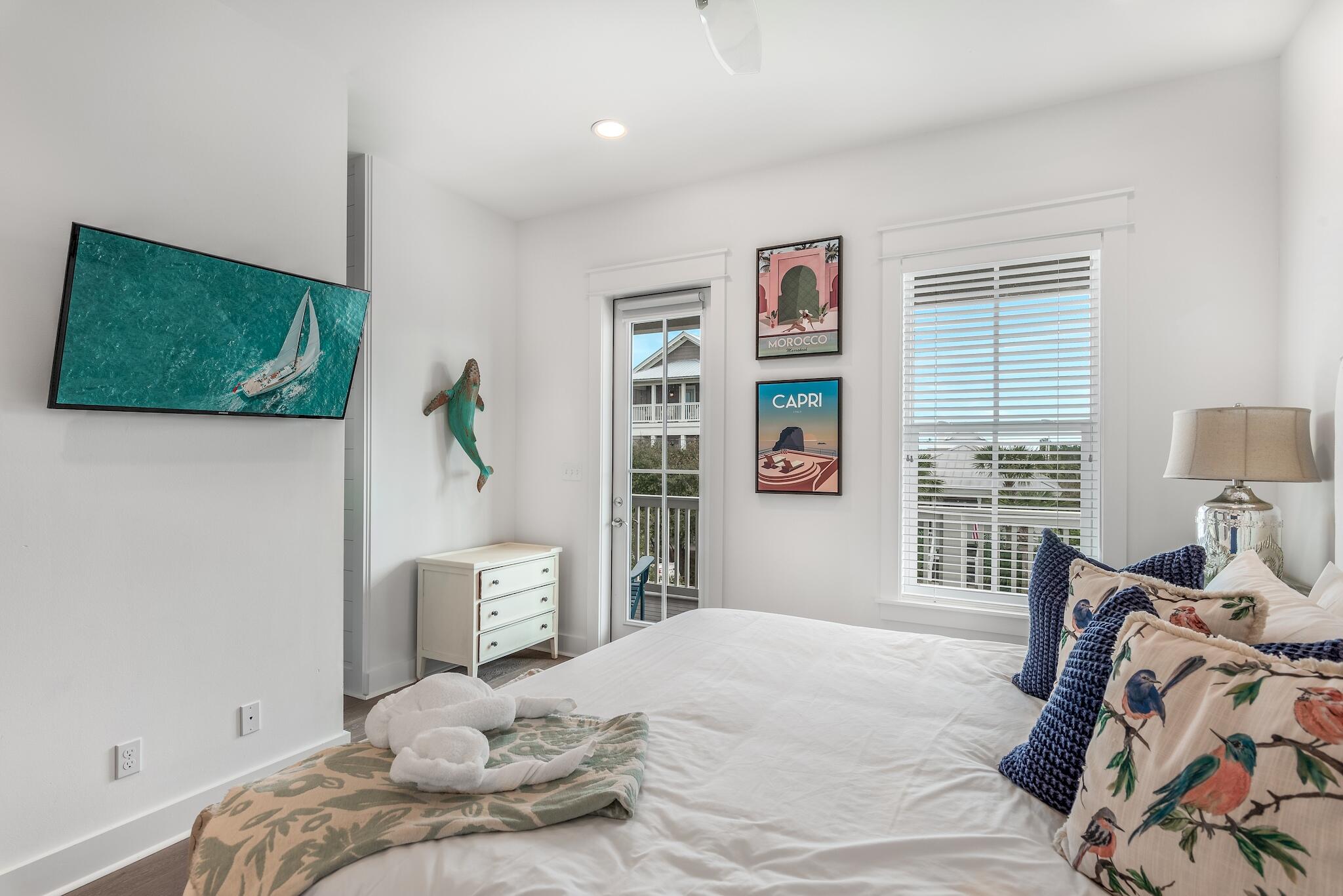 101 A St Inlet Beach Inlet Beach, FL 32461 - Photo 29 of 49 a bedroom with a bed and a window