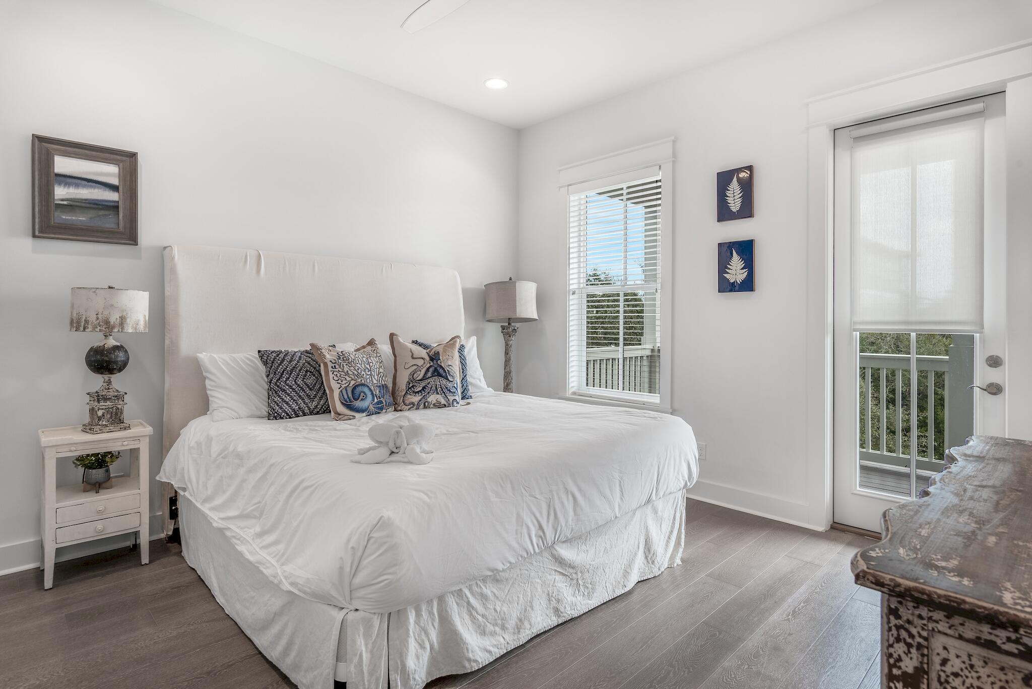 101 A St Inlet Beach Inlet Beach, FL 32461 - Photo 31 of 49 a bed sitting in a bedroom next to a window