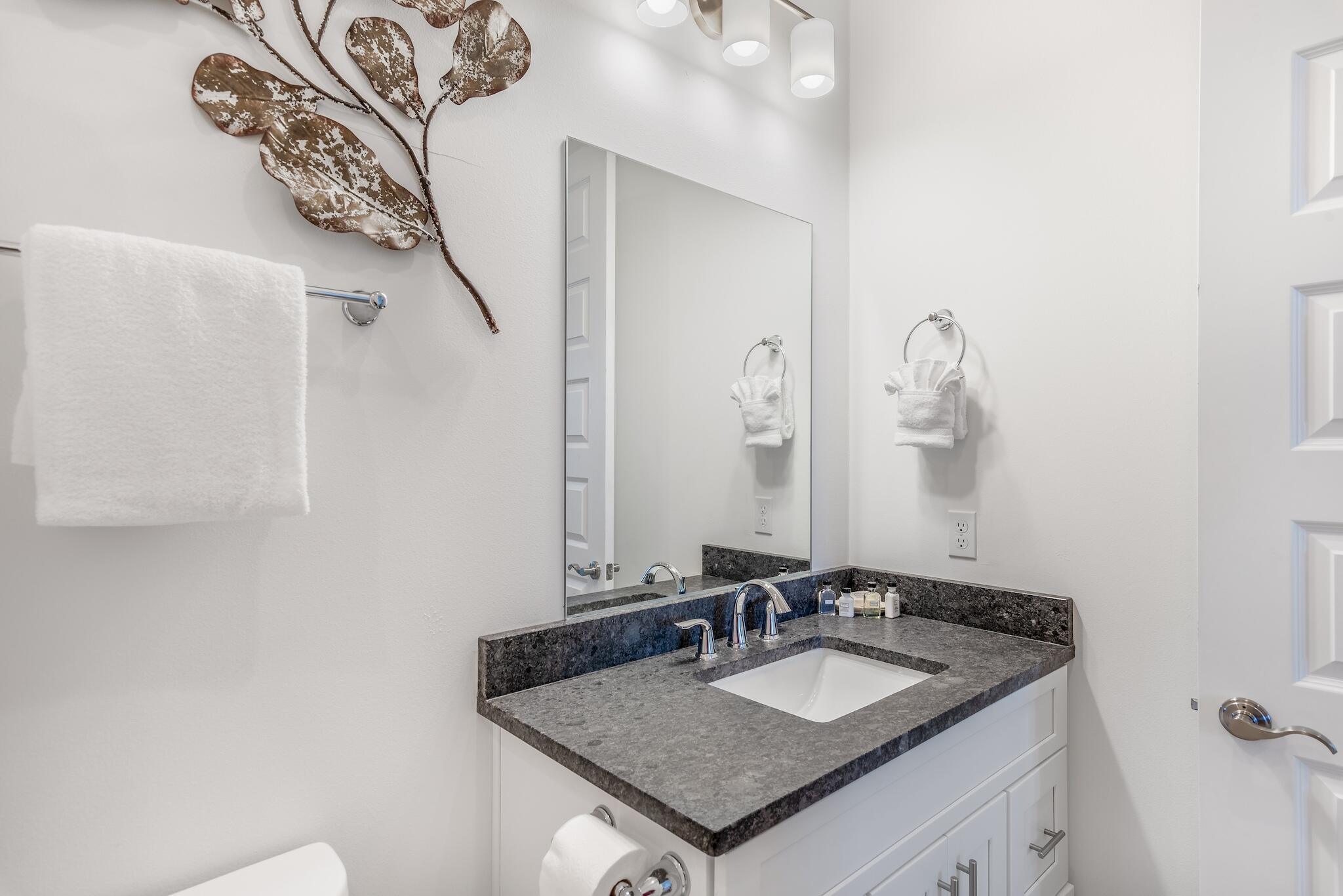 101 A St Inlet Beach Inlet Beach, FL 32461 - Photo 33 of 49 a bathroom with a granite countertop sink and a mirror