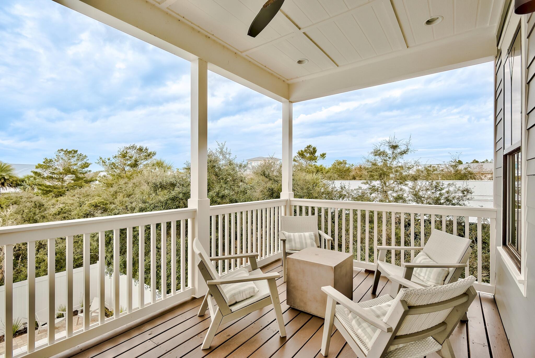 101 A St Inlet Beach Inlet Beach, FL 32461 - Photo 37 of 49 a view of a chair and table on the balcony