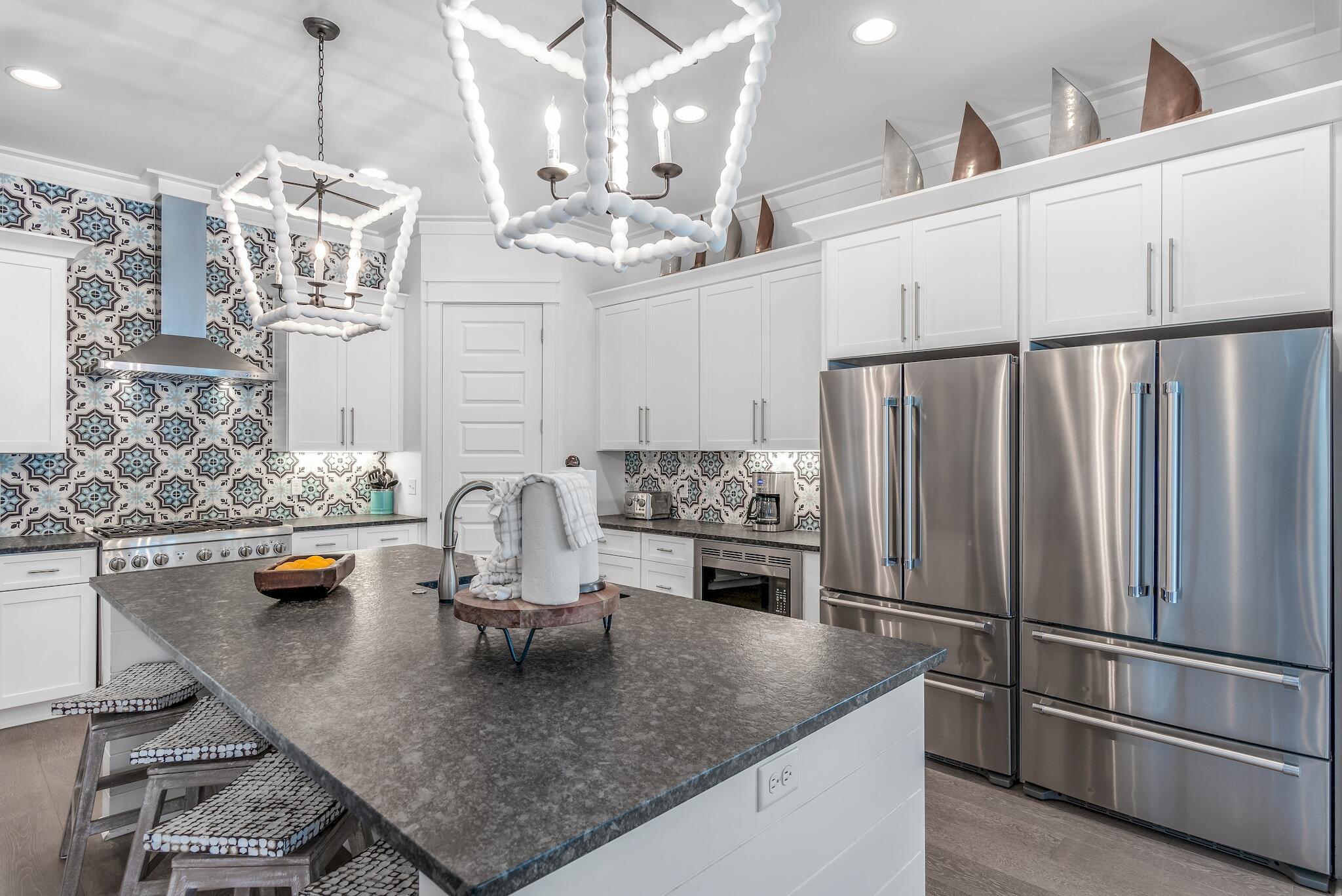 101 A St Inlet Beach Inlet Beach, FL 32461 - Photo 4 of 49 a kitchen with stainless steel appliances granite countertop a sink refrigerator and cabinets