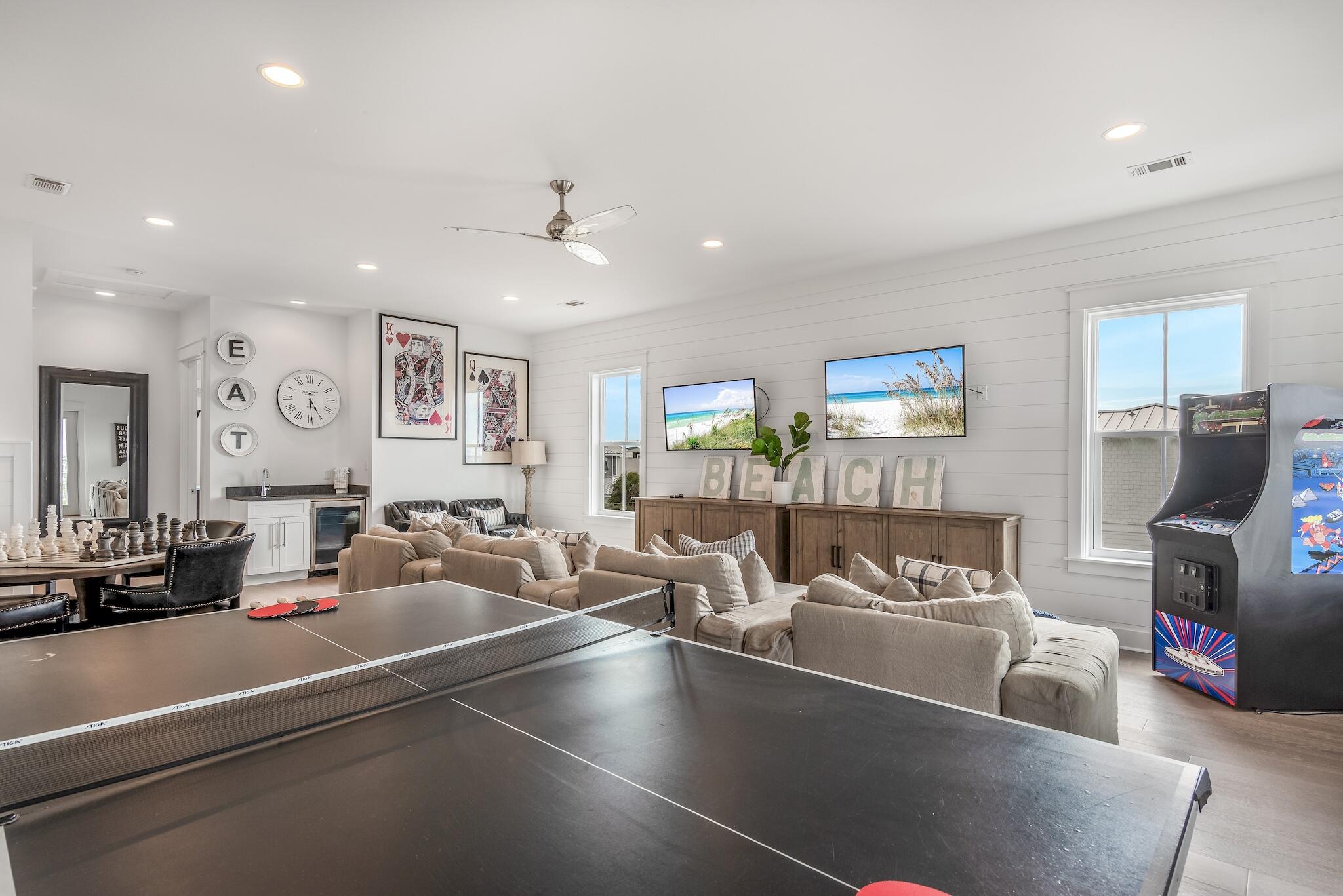 101 A St Inlet Beach Inlet Beach, FL 32461 - Photo 41 of 49 a living room with furniture and a flat screen tv