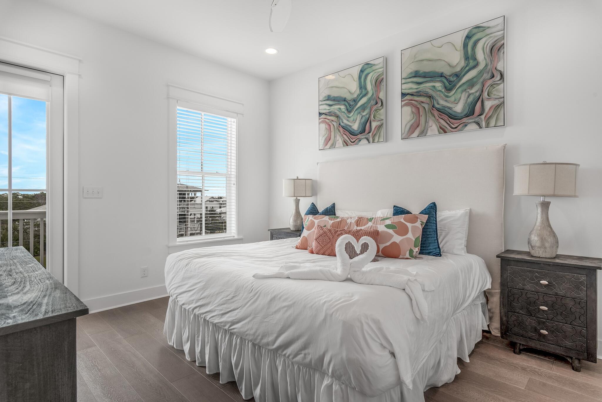 101 A St Inlet Beach Inlet Beach, FL 32461 - Photo 45 of 49 a bedroom with a bed and painting on the wall