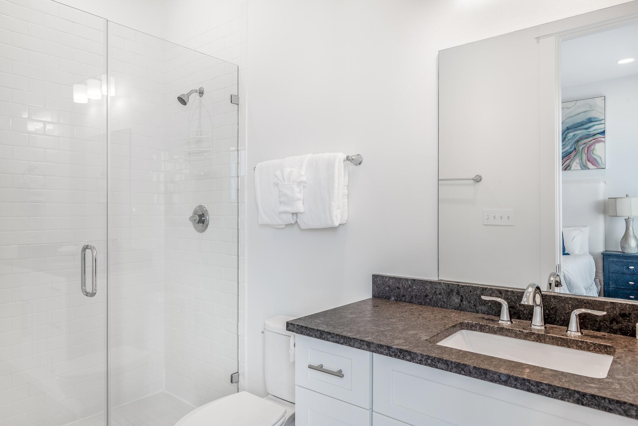 101 A St Inlet Beach Inlet Beach, FL 32461 - Photo 47 of 49 a bathroom with a granite countertop sink a mirror and shower