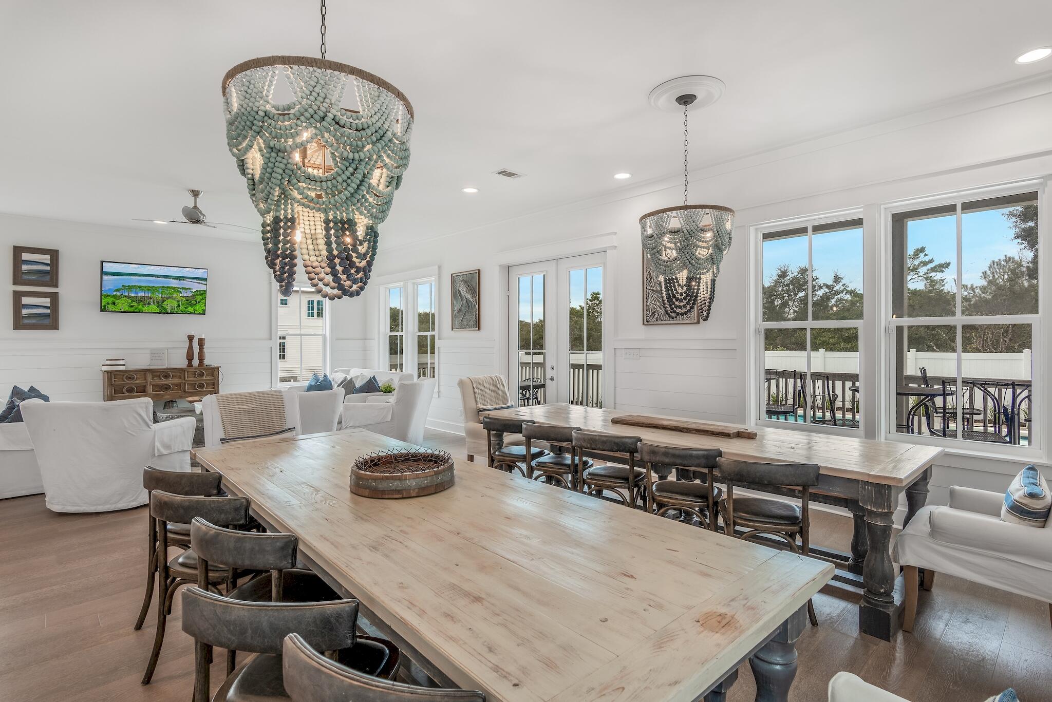 101 A St Inlet Beach Inlet Beach, FL 32461 - Photo 10 of 49 a view of a dining room with furniture wooden floor and chandelier