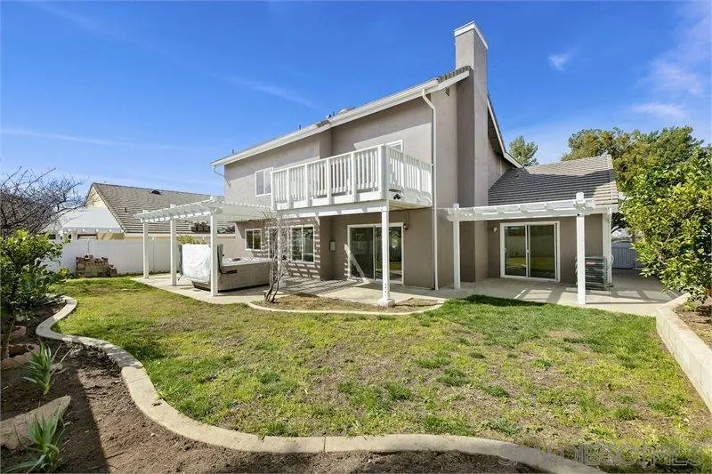44113 Northgate Avenue Temecula, CA 92592 - Photo 11 of 30 a view of a house with backyard porch and sitting area