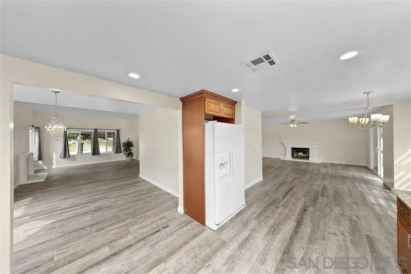 44113 Northgate Avenue Temecula, CA 92592 - Photo 15 of 30 a view of hallway with wooden floor and windows