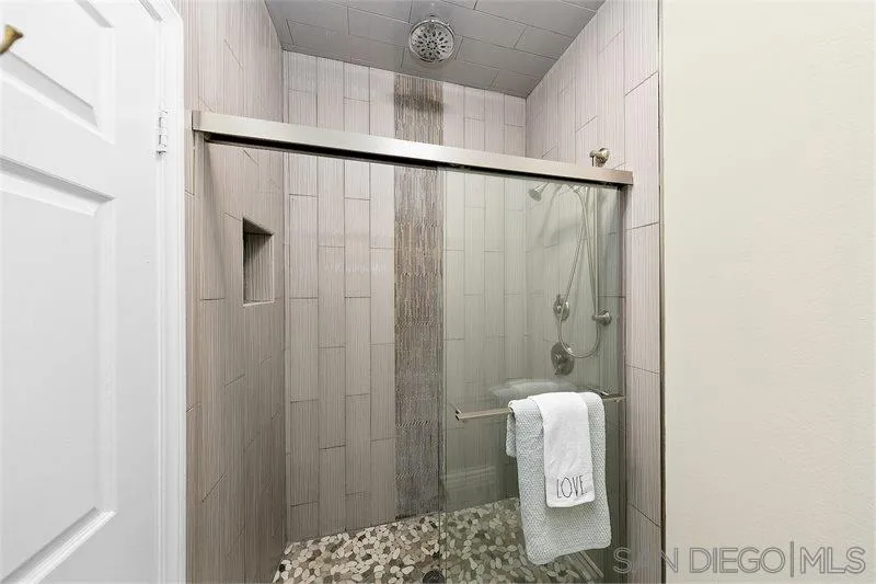 44113 Northgate Avenue Temecula, CA 92592 - Photo 23 of 30 a bathroom with a shower