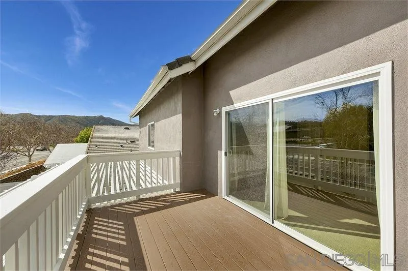 44113 Northgate Avenue Temecula, CA 92592 - Photo 26 of 30 a view of a balcony with wooden floor and fence