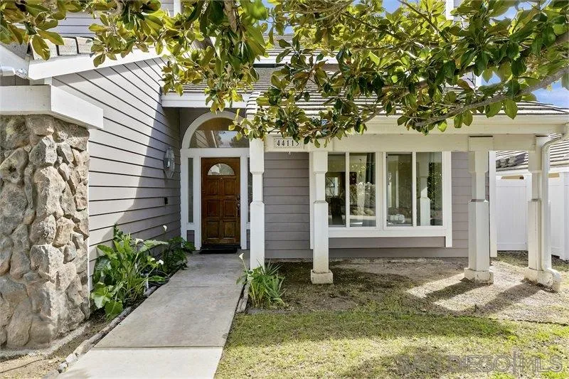 44113 Northgate Avenue Temecula, CA 92592 - Photo 3 of 30 a front view of a house with garden