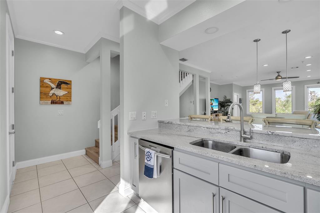 848 Evergreen Way Longboat Key, FL 34228 - Photo 11 of 66 a kitchen with a sink and cabinets