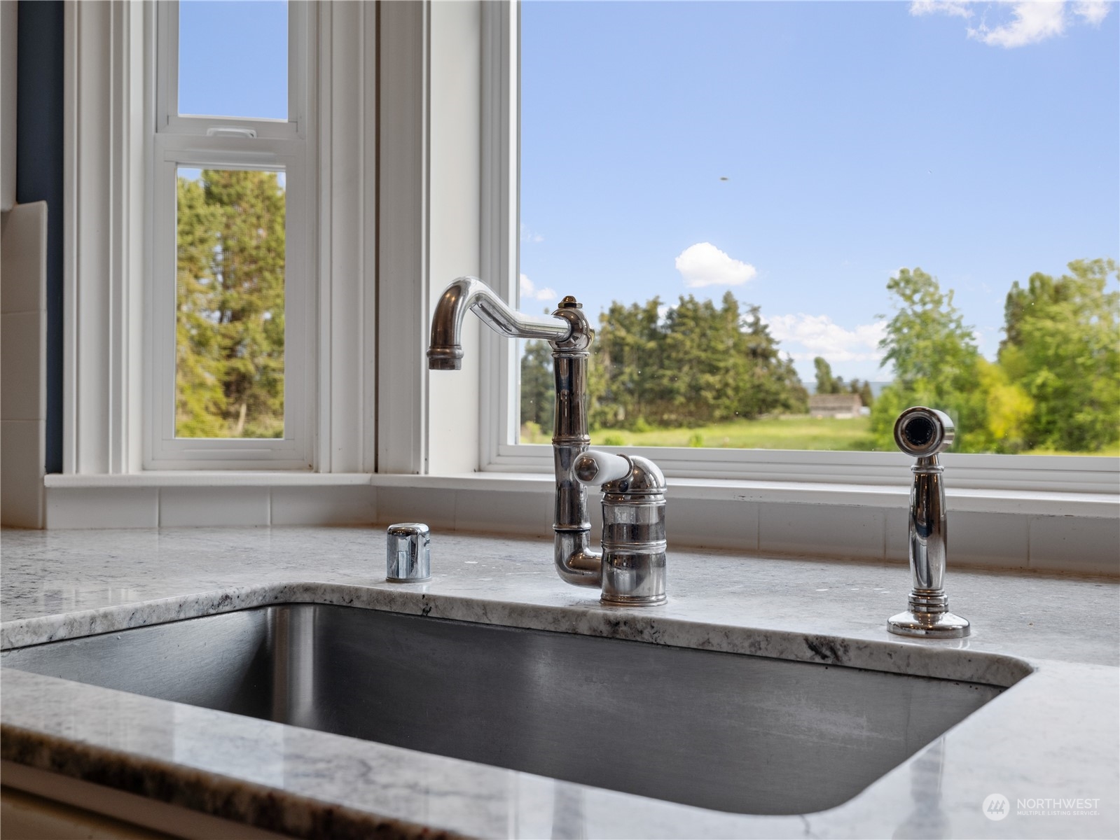 2619 Kitchen-Dick Road Sequim, WA 98382 - Photo 11 of 40 a kitchen with a sink and a window
