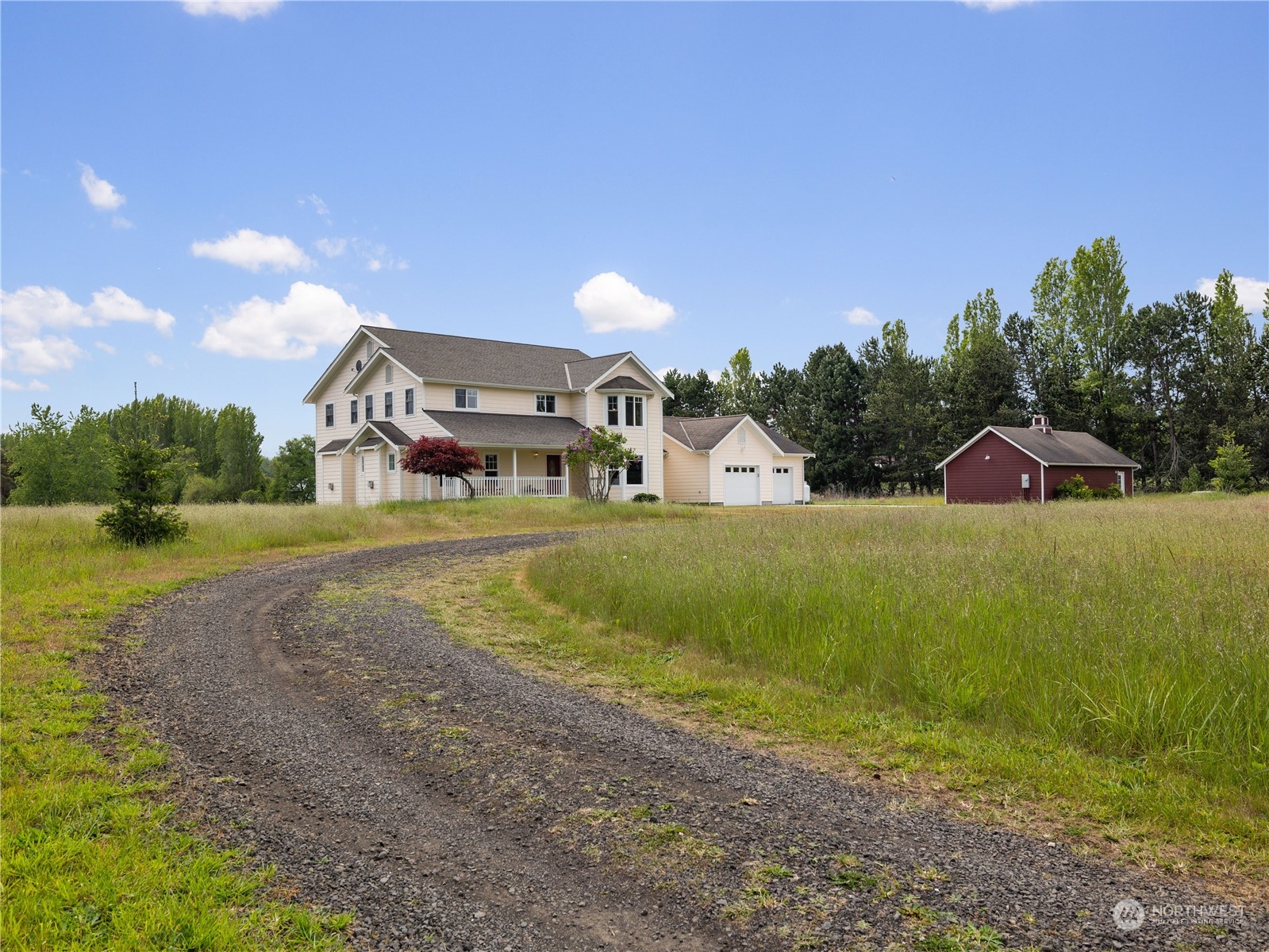 2619 Kitchen-Dick Road Sequim, WA 98382 - Photo 2 of 40 a view of a garden with a house