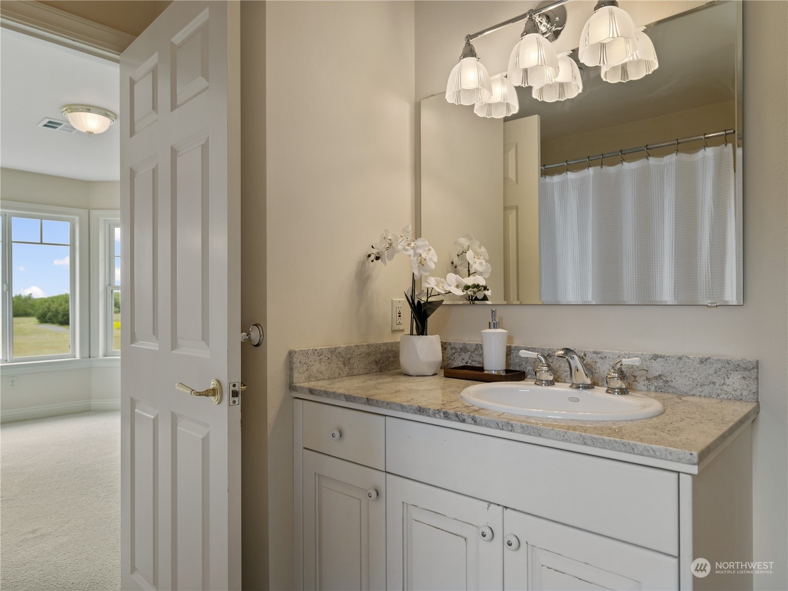 2619 Kitchen-Dick Road Sequim, WA 98382 - Photo 28 of 40 a bathroom with a granite countertop sink and a mirror