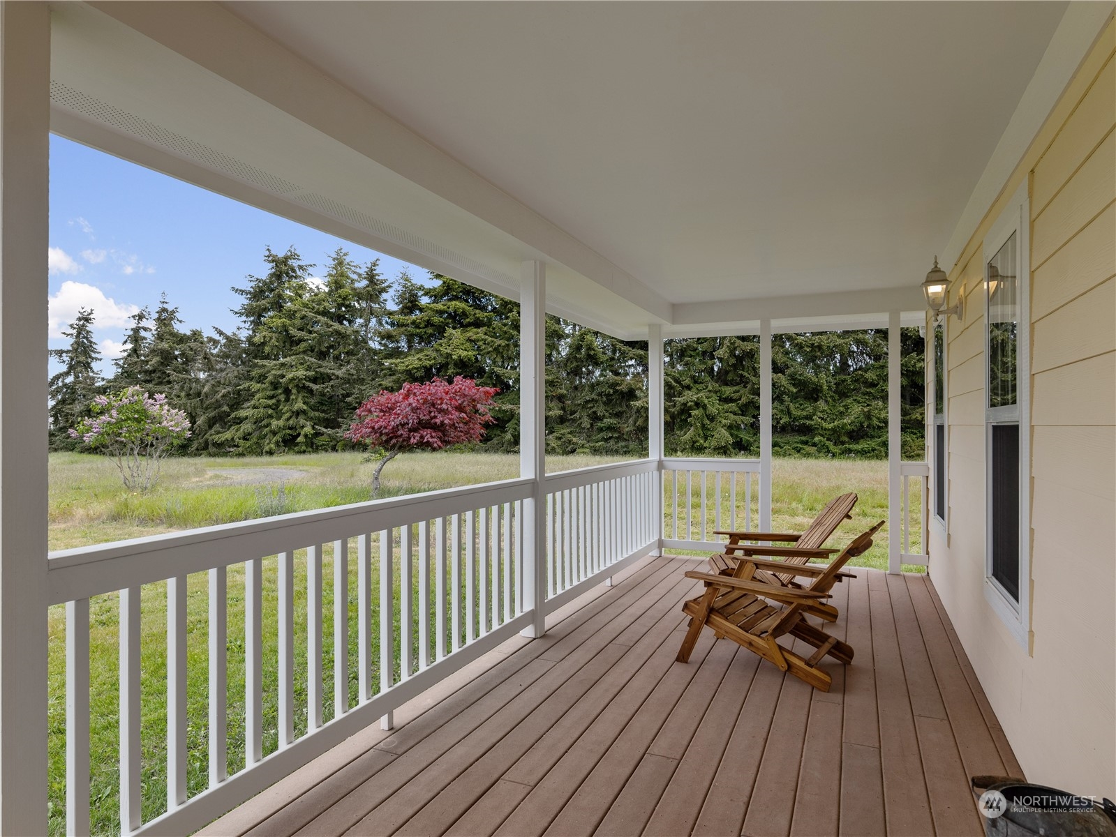 2619 Kitchen-Dick Road Sequim, WA 98382 - Photo 4 of 40 a view of balcony with wooden floor and outdoor seating