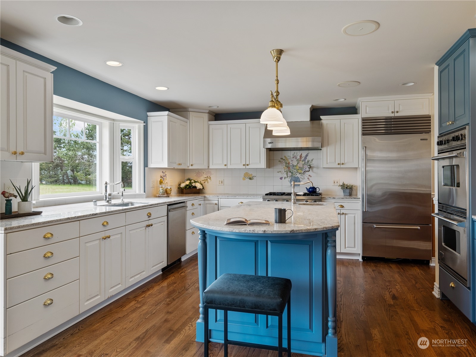 2619 Kitchen-Dick Road Sequim, WA 98382 - Photo 10 of 40 a kitchen with refrigerator cabinets and wooden floor