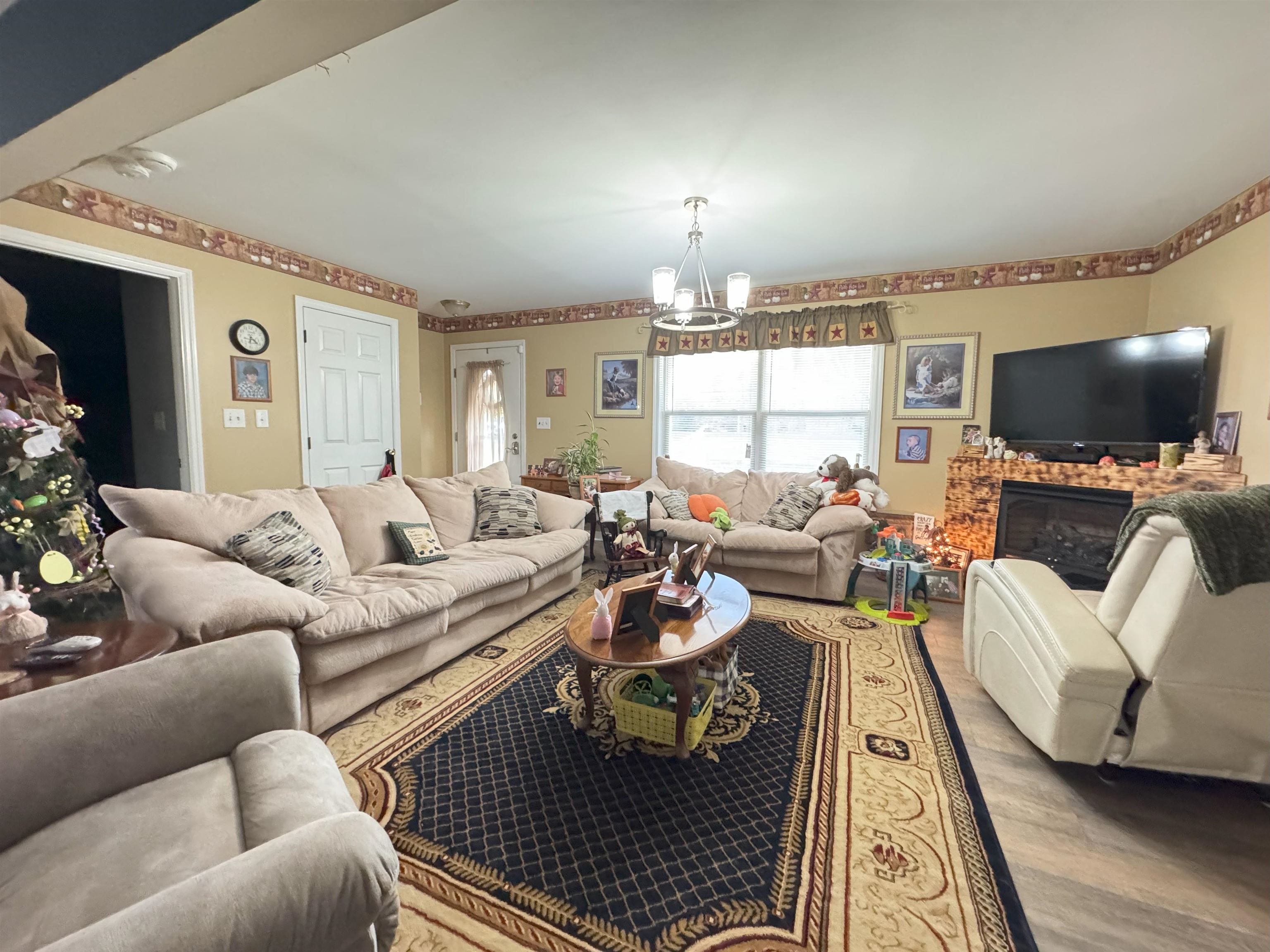 3355 Lyndhurst Road Stuarts Draft, VA 24477 - Photo 18 of 38 a living room with furniture and a flat screen tv