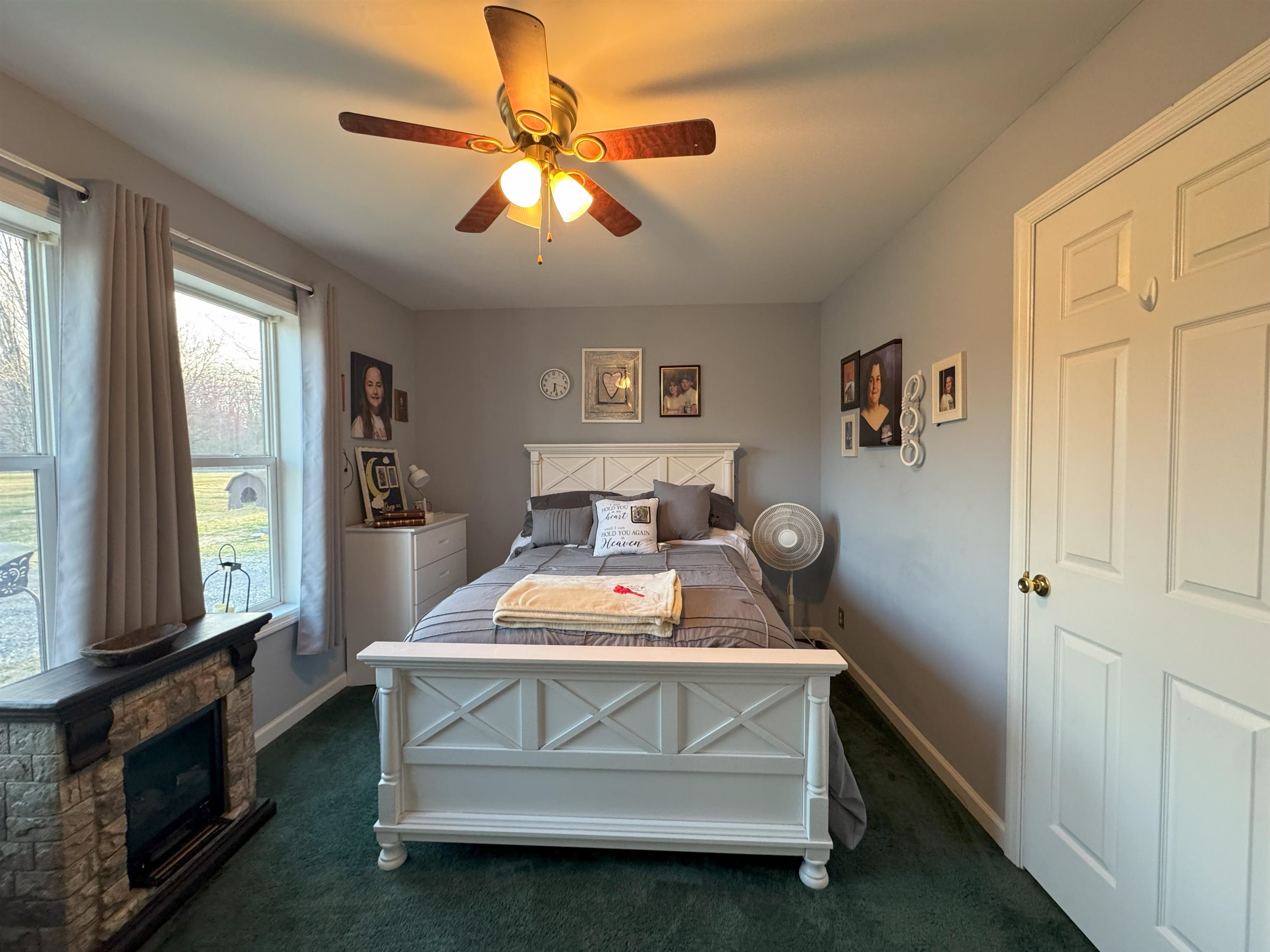 3355 Lyndhurst Road Stuarts Draft, VA 24477 - Photo 30 of 38 a bed room with a bed and a chandelier