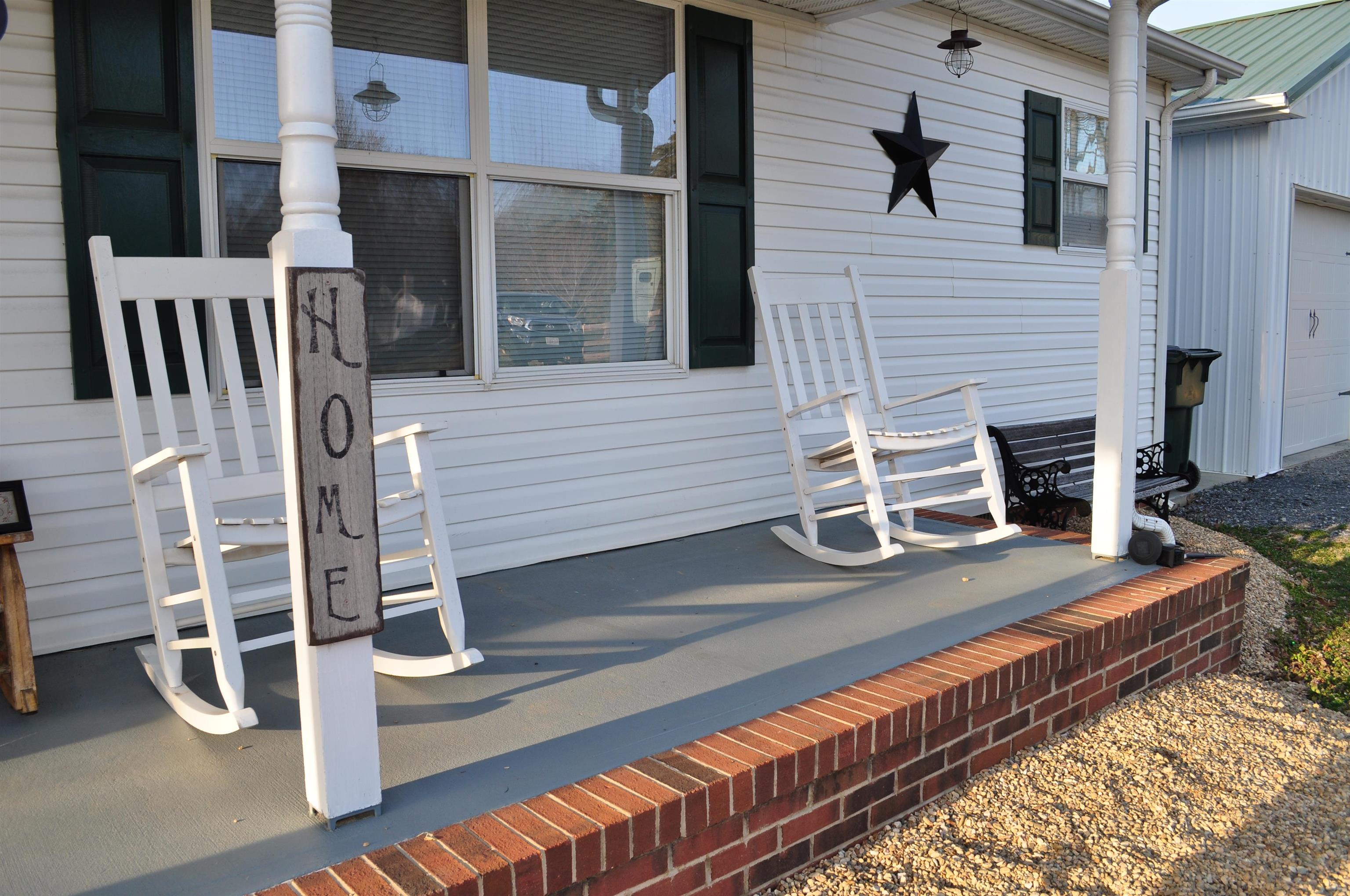 3355 Lyndhurst Road Stuarts Draft, VA 24477 - Photo 6 of 38 a view of a patio with wooden chairs