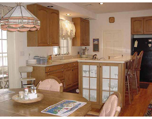 28 Hazen Road Shirley, MA 01464 - Photo 2 of 8 a bathroom with a sink a mirror and a table