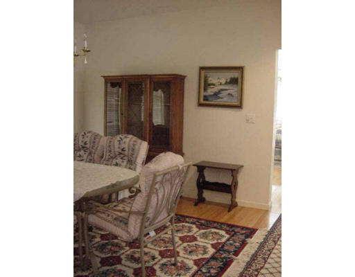 28 Hazen Road Shirley, MA 01464 - Photo 4 of 8 a chair and a table in a room
