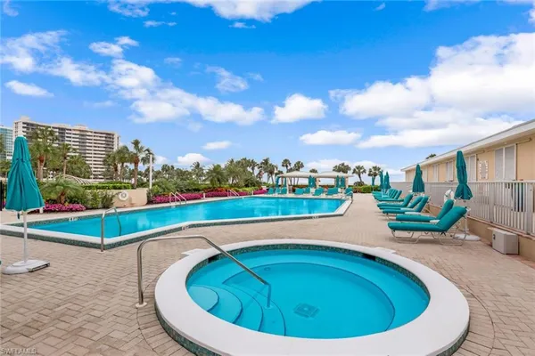 a view of a swimming pool with a terrace