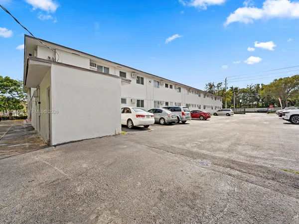a view of the road with cars