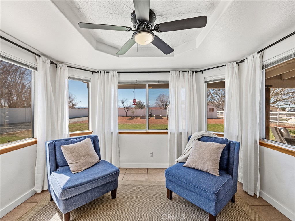 18965 Shetland Road Apple Valley, CA 92308 - Photo 12 of 45 a living room with furniture and a window