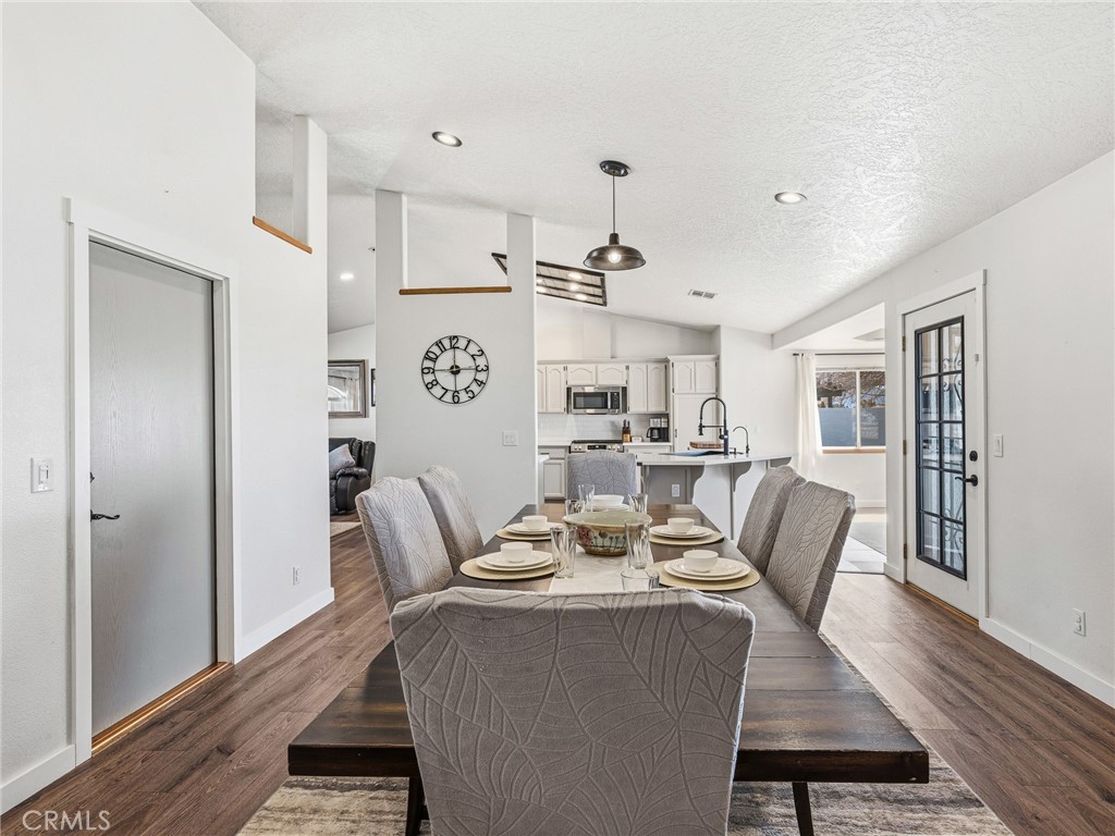 18965 Shetland Road Apple Valley, CA 92308 - Photo 15 of 45 a dining room with furniture and wooden floor