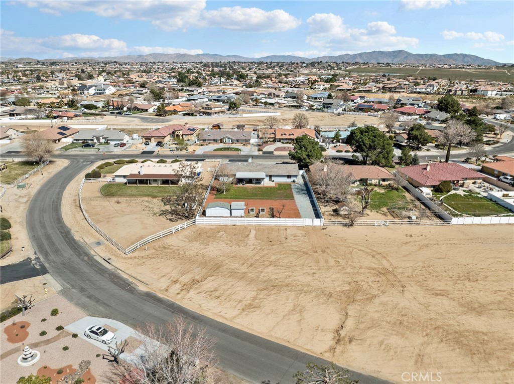 18965 Shetland Road Apple Valley, CA 92308 - Photo 45 of 45 an aerial view of residential houses with outdoor space