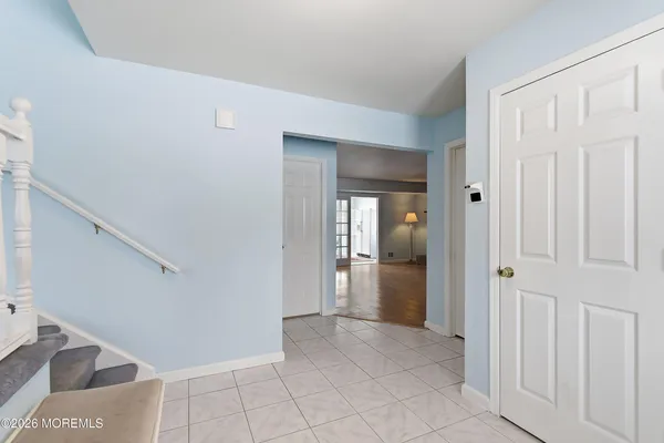 a view of an entryway with hallway