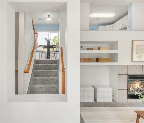 a kitchen with a table and chairs in it