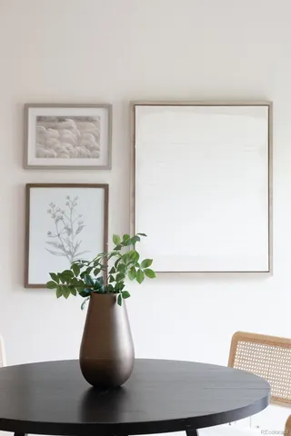 a kitchen with white cabinets