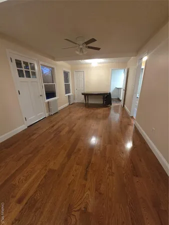 a view of livingroom and hardwood floor