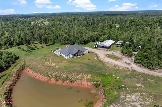 a view of a lake from a yard