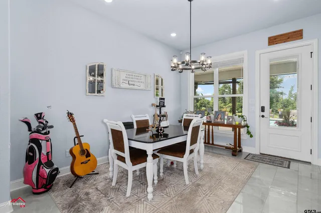 a room with a wooden floor and a sink