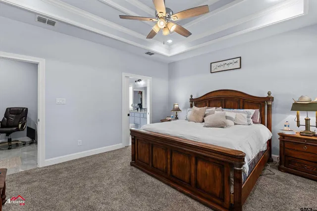 a spacious bathroom with a double vanity sink double and a mirror