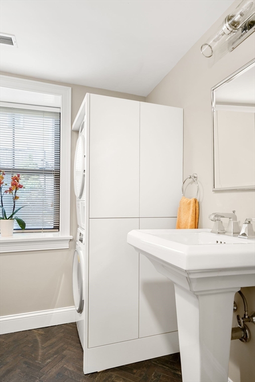 3 Harvard Place, Unit 1 Boston, MA 02129 - Photo 9 of 15 a bathroom with a sink and a mirror