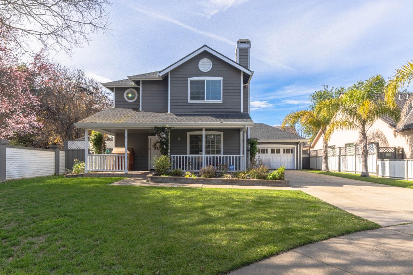 18 Hancock Circle Salinas, CA 93906 - Photo 1 of 36 a front view of a house with a yard and trees