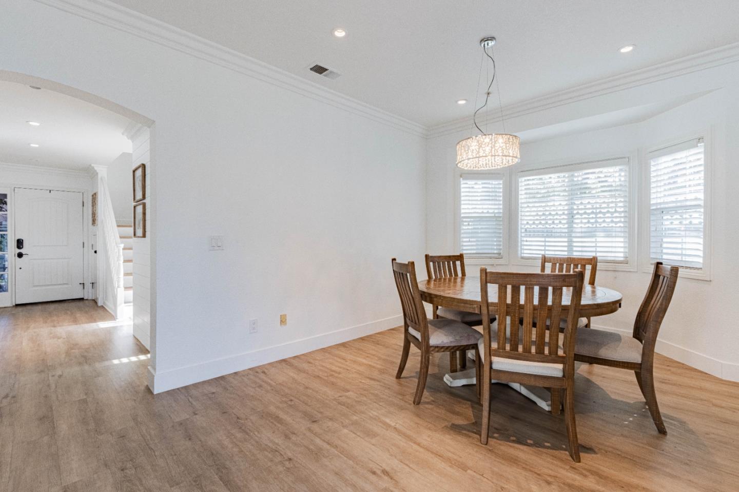 18 Hancock Circle Salinas, CA 93906 - Photo 12 of 36 a view of a dining room with furniture window and wooden floor