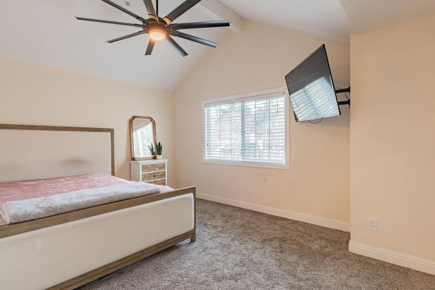 18 Hancock Circle Salinas, CA 93906 - Photo 22 of 36 a room with a bed and a chandelier