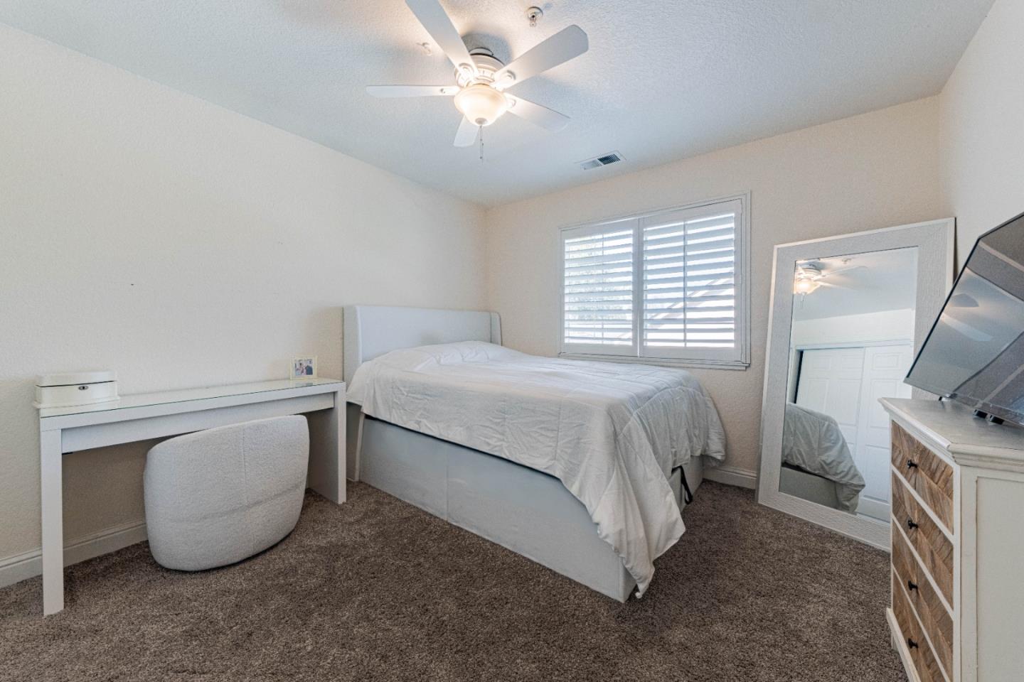 18 Hancock Circle Salinas, CA 93906 - Photo 26 of 36 a bed room with a bed and a television