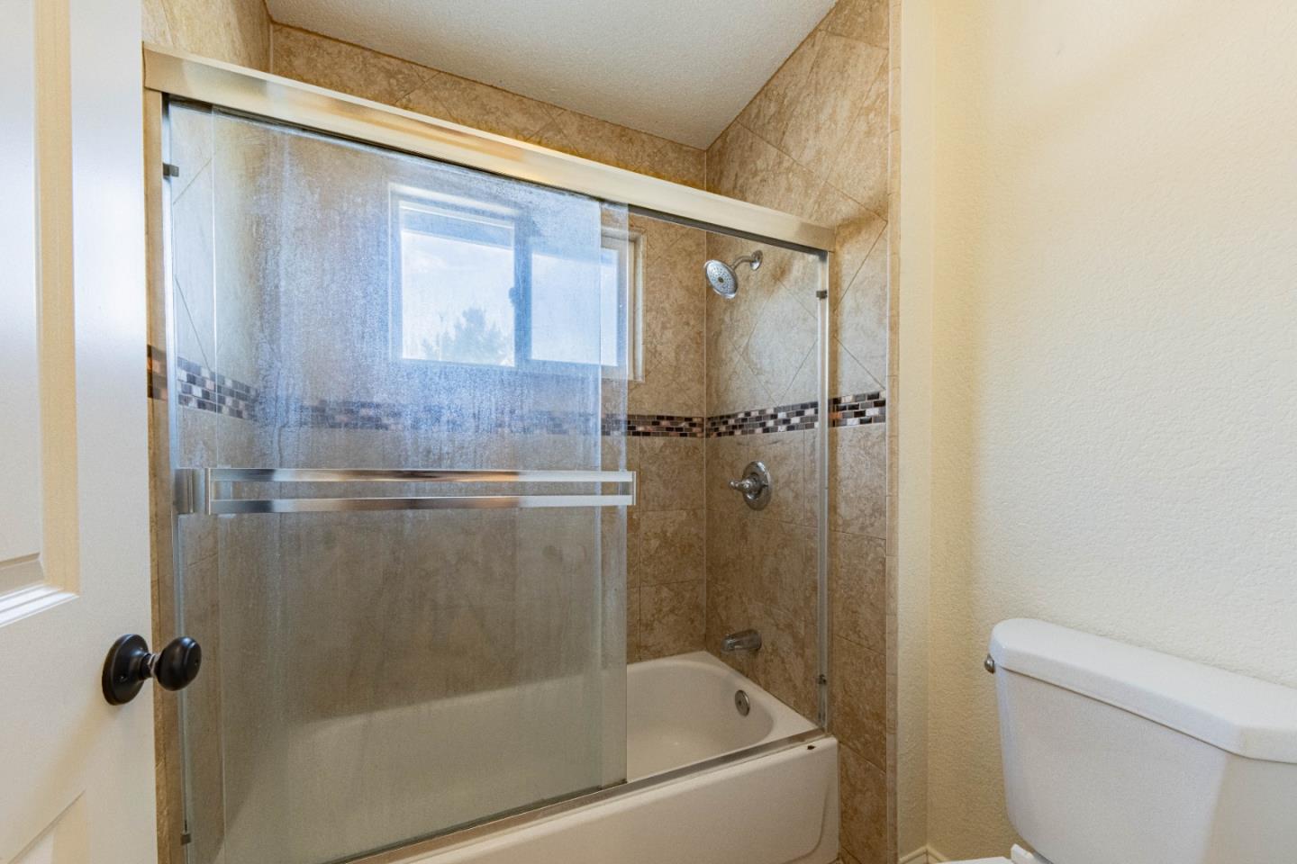 18 Hancock Circle Salinas, CA 93906 - Photo 30 of 36 a bathroom with a shower and toilet