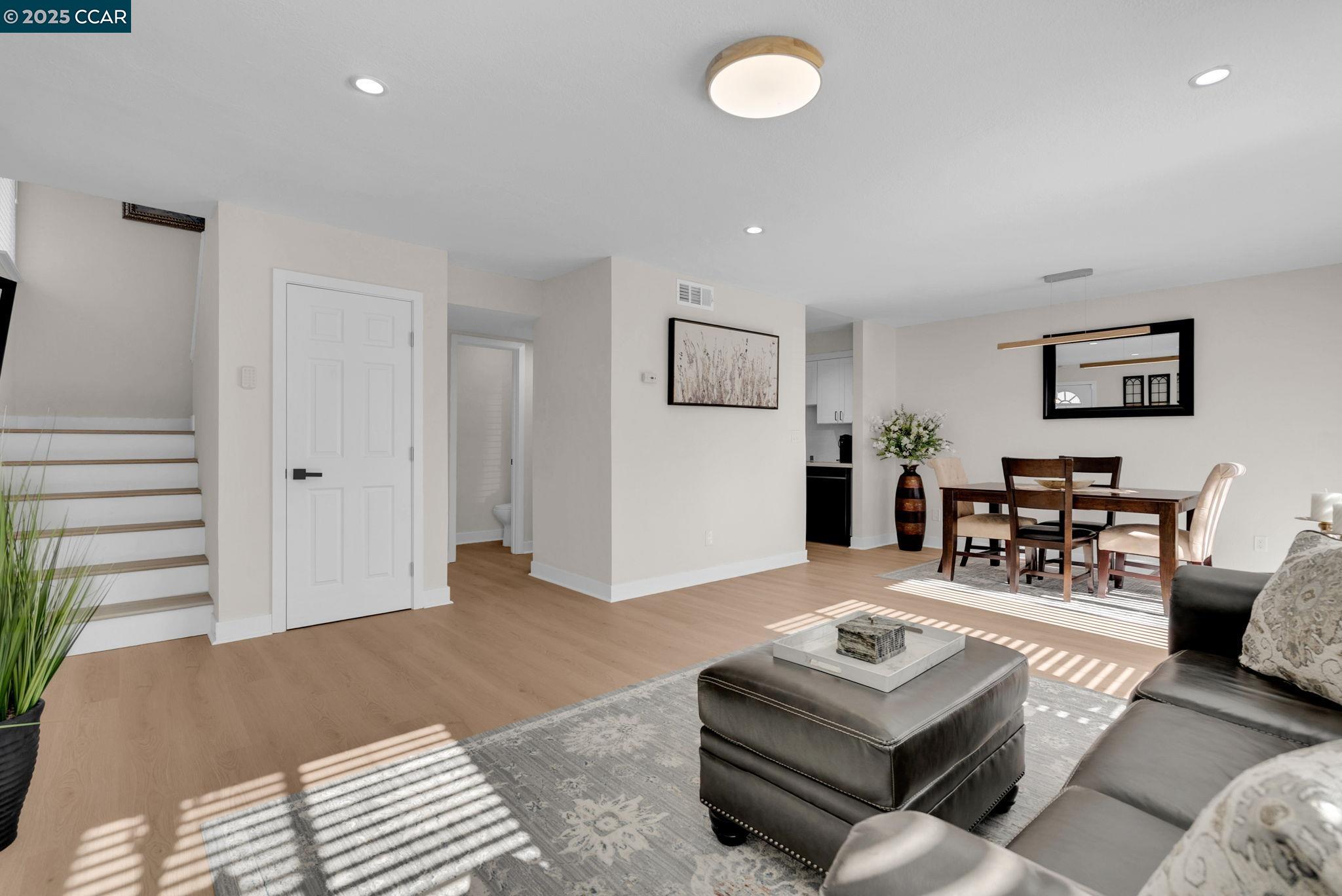 406 Olympus, Unit 5 Hercules, CA 94547 - Photo 4 of 49 a living room with furniture